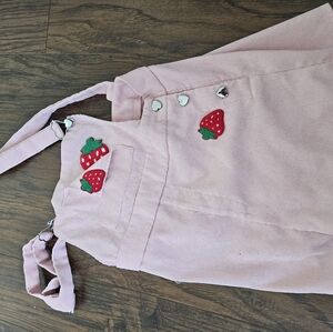 Kids pink overalls with strawberry